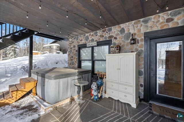 interior space with a hot tub