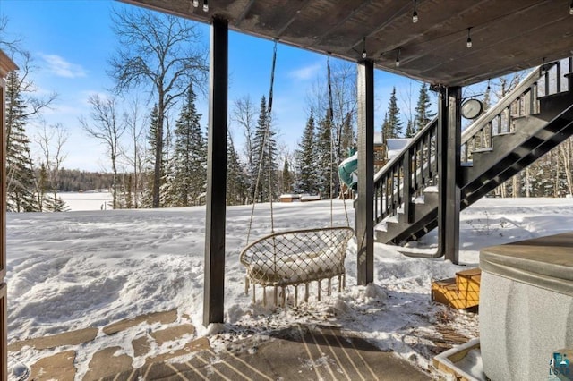 view of snow covered patio