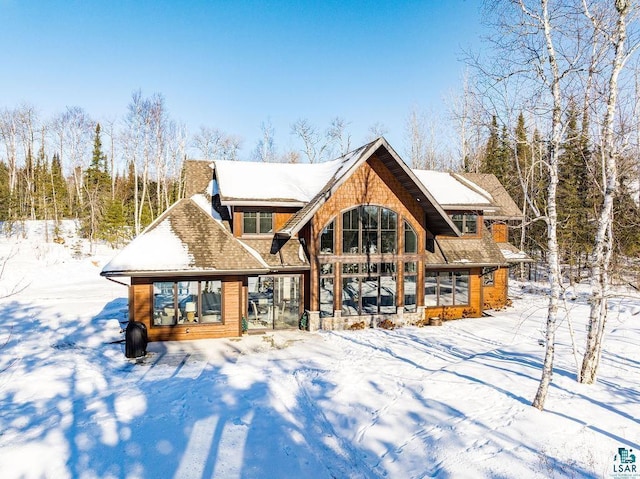 view of snow covered property