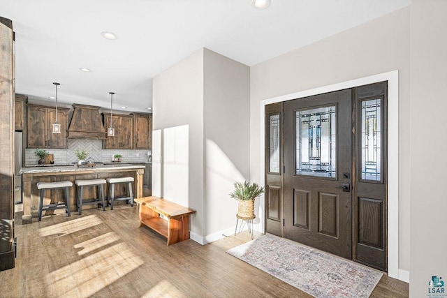 entrance foyer with light hardwood / wood-style floors