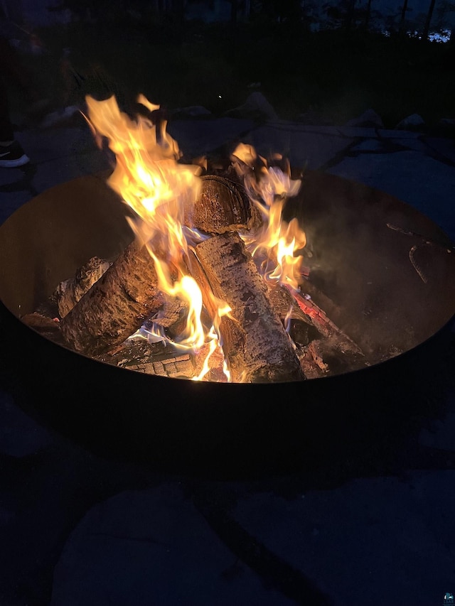 exterior details with a fire pit