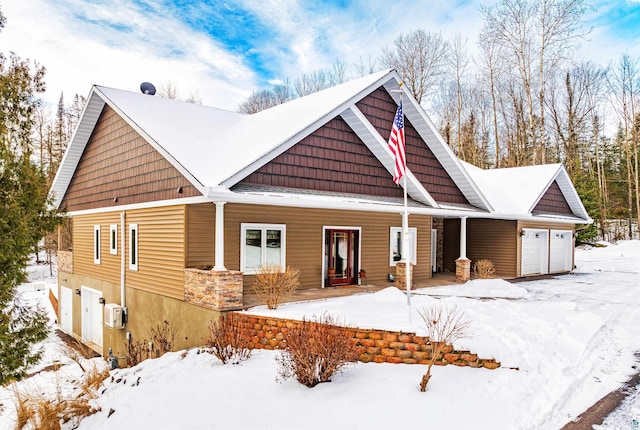 craftsman inspired home with a garage