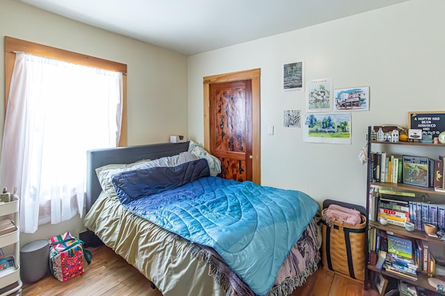 bedroom featuring multiple windows