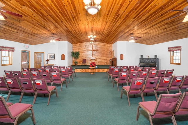 cinema with plenty of natural light, wooden ceiling, and ceiling fan