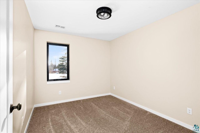 view of carpeted spare room