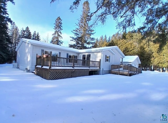 view of front of property with a deck