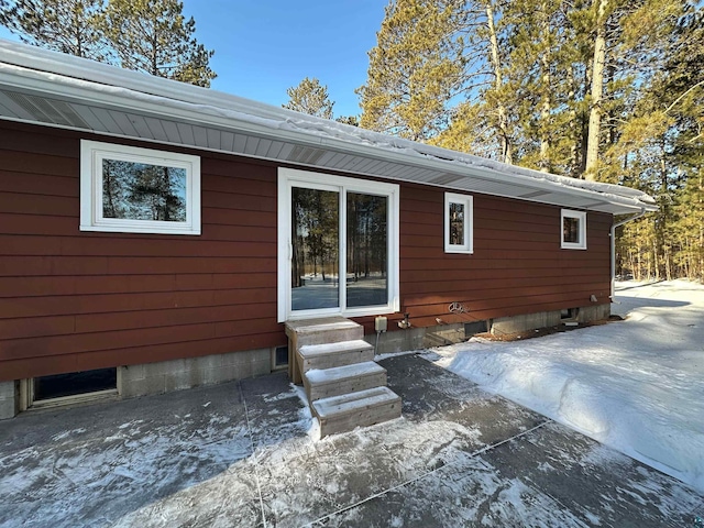 rear view of property featuring a patio area