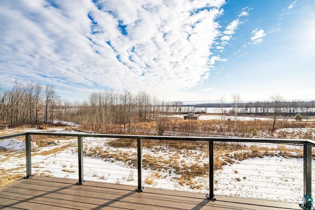 view of snow covered deck