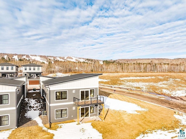 view of snow covered property