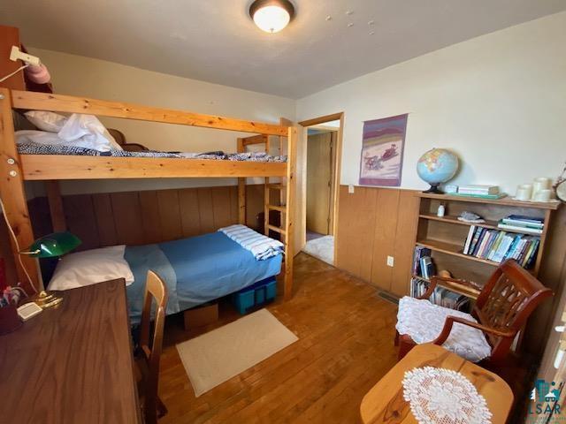 bedroom featuring hardwood / wood-style flooring