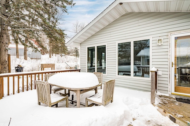 view of snow covered deck