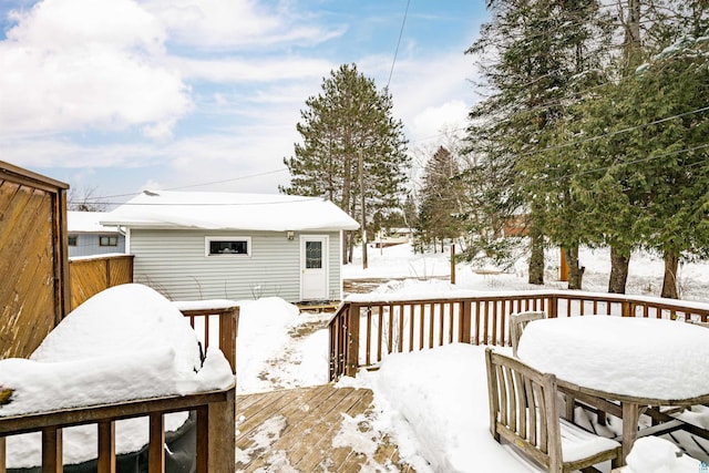 view of snow covered deck