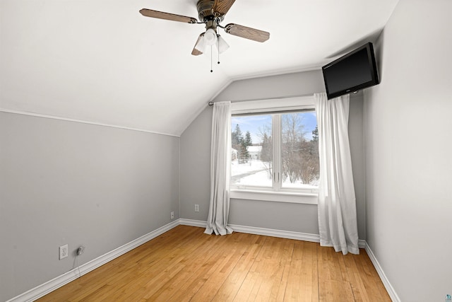 additional living space featuring ceiling fan, lofted ceiling, and light hardwood / wood-style floors