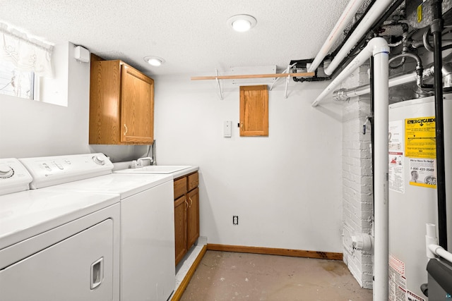 laundry room with sink, gas water heater, cabinets, a textured ceiling, and washer and clothes dryer