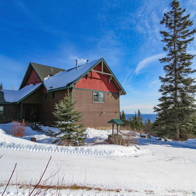 view of snow covered property