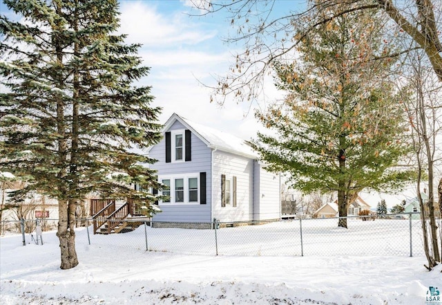 view of snow covered property