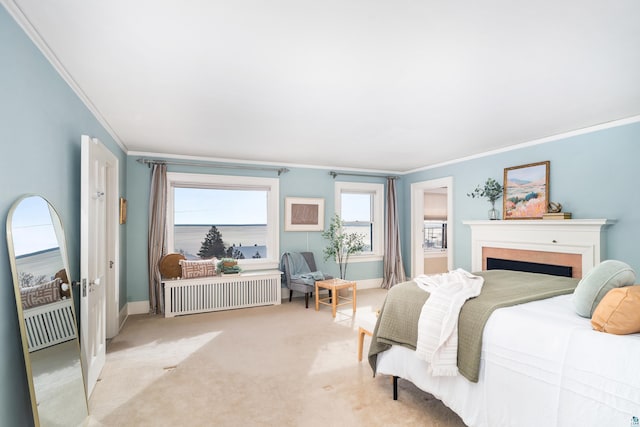 bedroom featuring radiator heating unit, ornamental molding, and light colored carpet