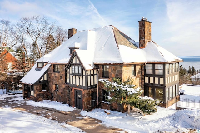 view of snow covered house