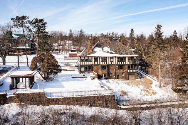 view of snow covered property