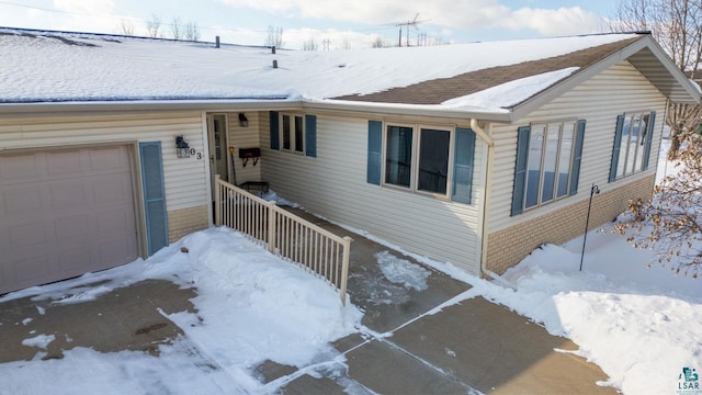 view of front of house with a garage