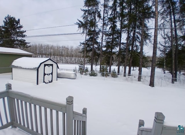 view of yard covered in snow