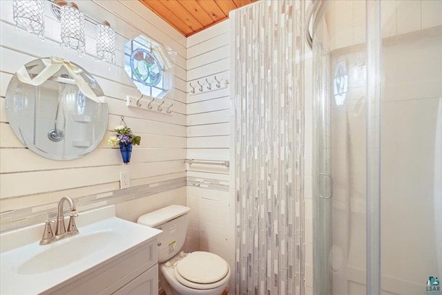 bathroom with toilet, an enclosed shower, wood ceiling, vanity, and wooden walls