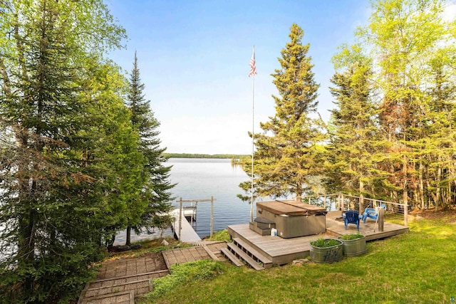 1480 Devil Track Rd, Grand Marais, MN 55604 - dock with a yard, a hot tub, and a deck with water view