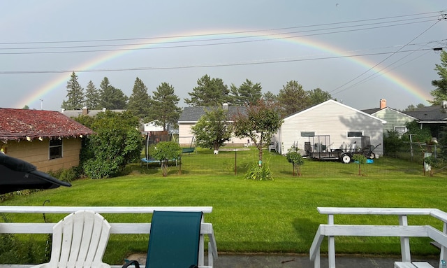 view of yard with a trampoline