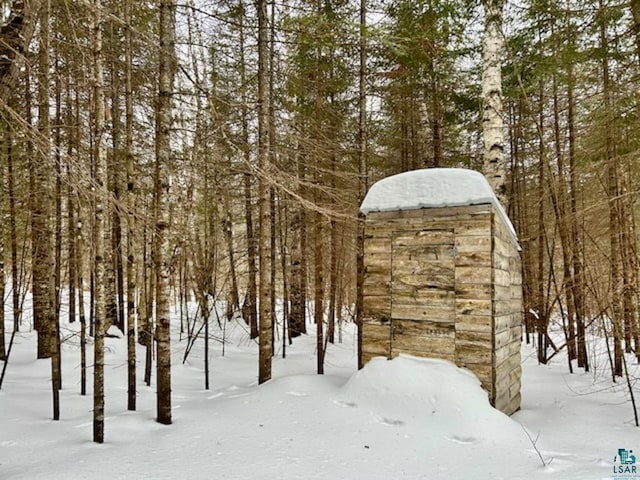 view of yard layered in snow