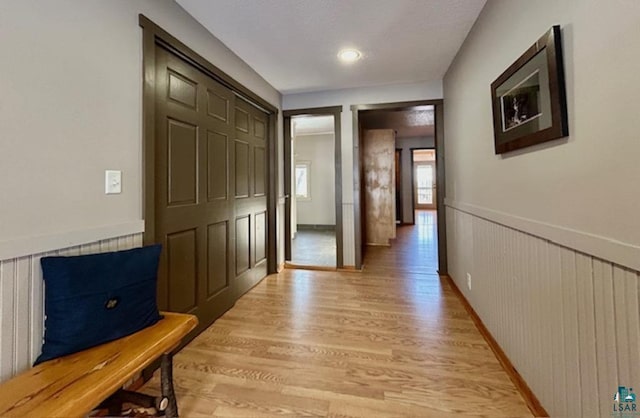 hallway featuring light hardwood / wood-style floors