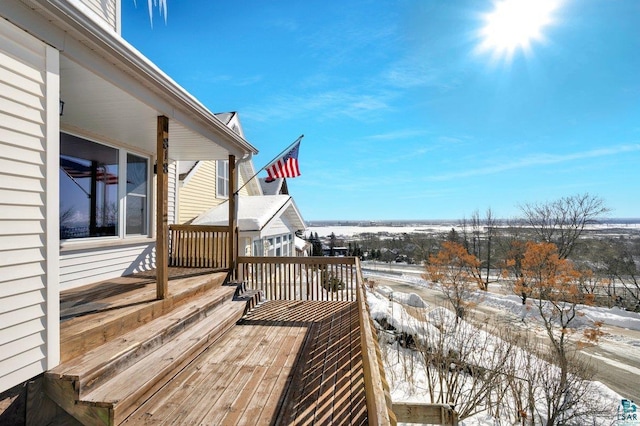 view of snow covered deck