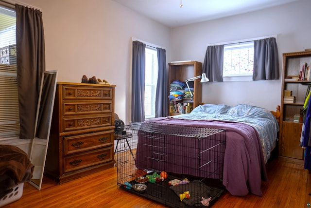 bedroom featuring hardwood / wood-style flooring