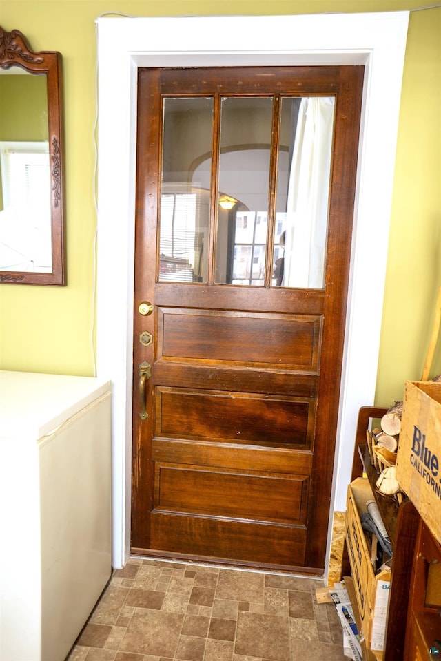 interior details featuring refrigerator