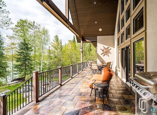 view of patio featuring outdoor dining space and grilling area