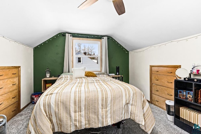 carpeted bedroom with lofted ceiling and ceiling fan