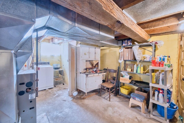 unfinished basement with washer / dryer