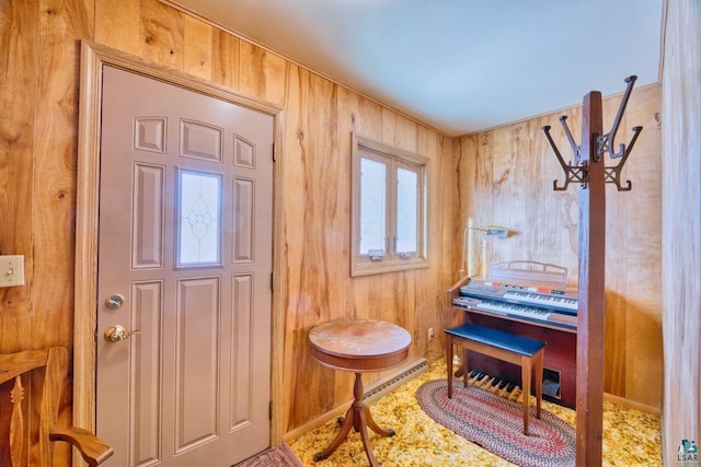 entrance foyer featuring wooden walls