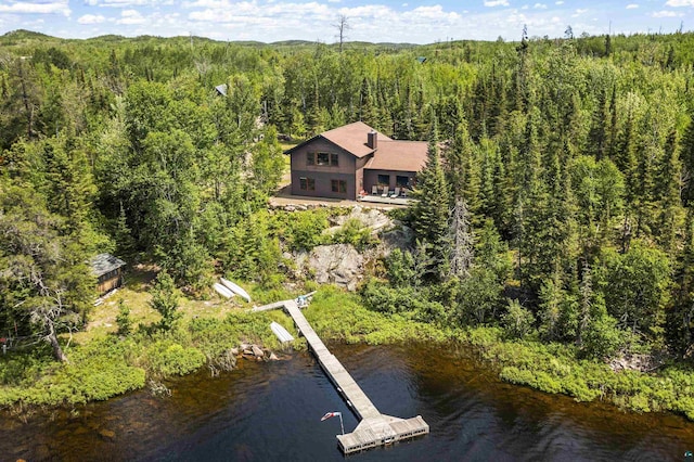 bird's eye view featuring a forest view