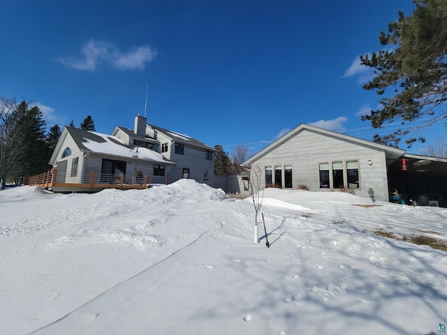 view of snow covered property