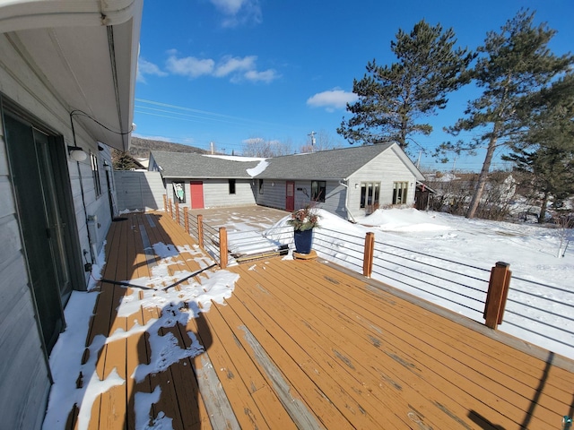 view of snow covered deck