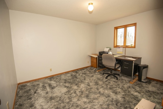 office with carpet flooring and baseboards