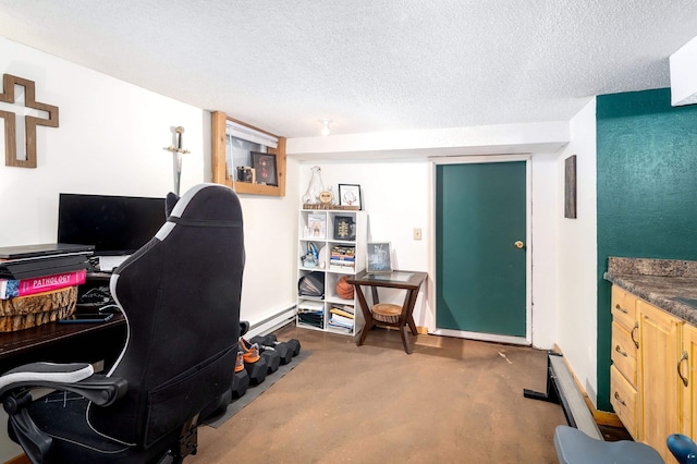 office featuring a textured ceiling and baseboards