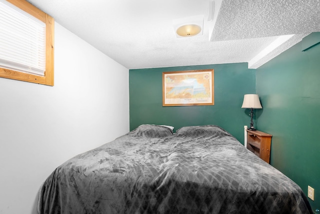 bedroom with a textured ceiling