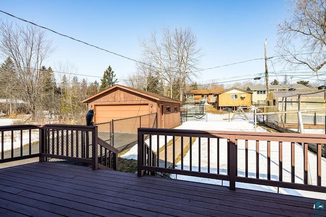 deck with a residential view and an outdoor structure