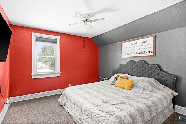 bedroom featuring carpet floors, ceiling fan, baseboards, and lofted ceiling