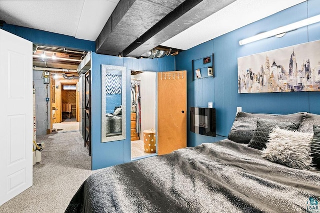 bedroom featuring carpet and a closet