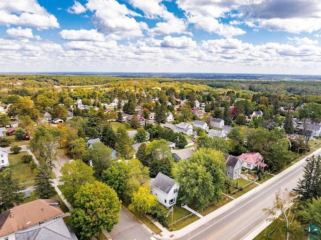 bird's eye view with a residential view and a view of trees