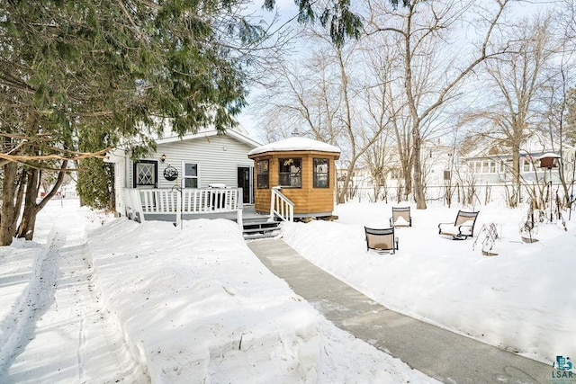 view of front of house with a deck