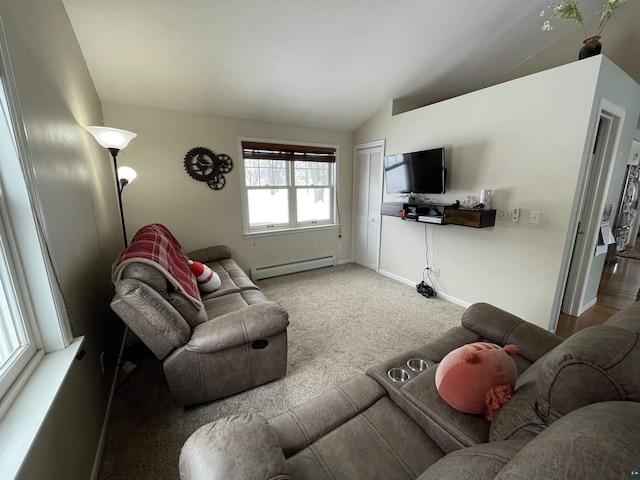 living room featuring carpet floors, a baseboard radiator, vaulted ceiling, and baseboards