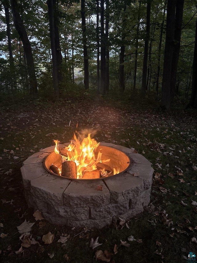 details featuring an outdoor fire pit